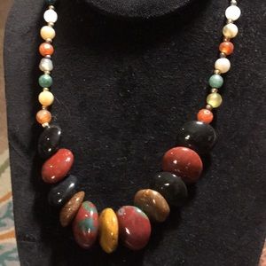 Polished stones, 18" in length assorted colors